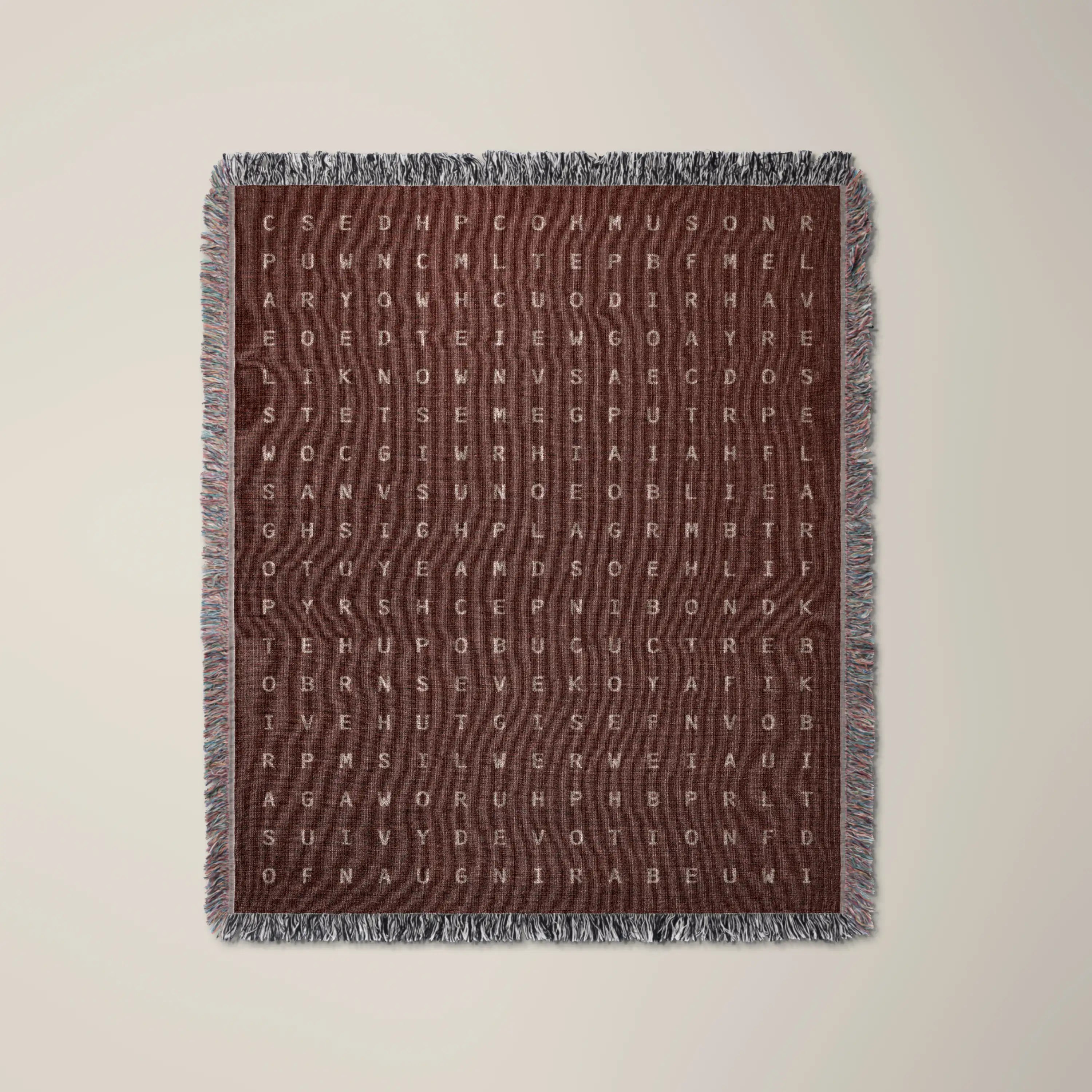 Love — No. 01 woven blanket in Garnet, a grid of cream letters across olive cotton with words woven into the pattern. #color_garnet