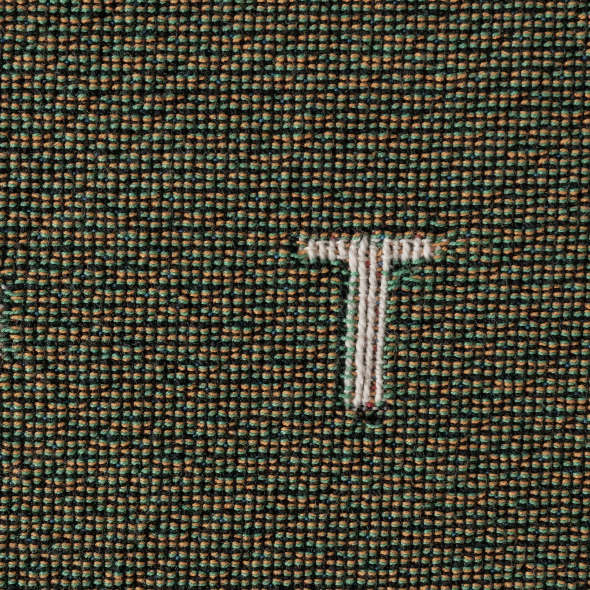 Love — No. 01 in Olive, close up, with partial letters visible across the cotton weave. #color_olive