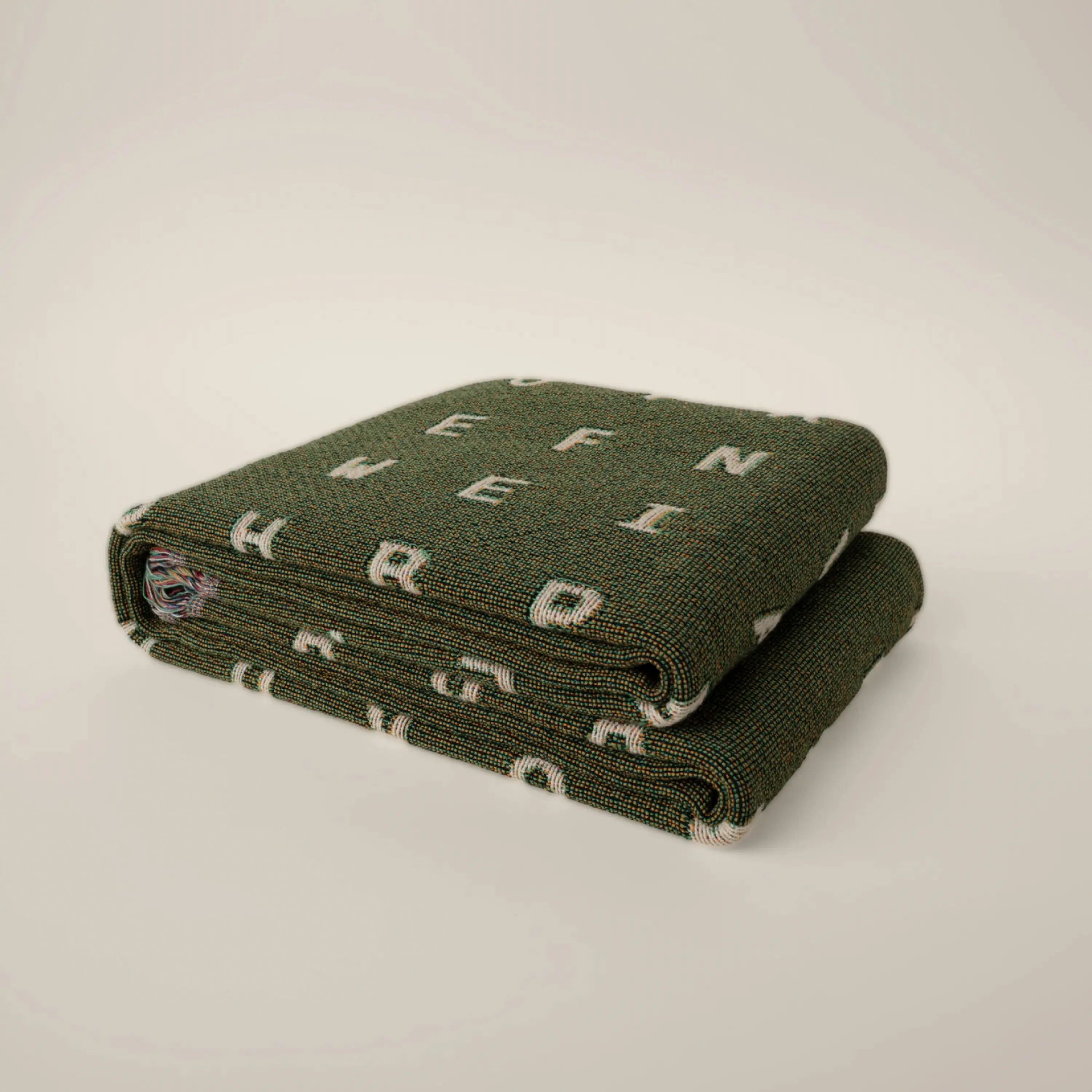 Love — No. 01 in Olive, folded, with partial letters visible across the cotton weave. #color_olive