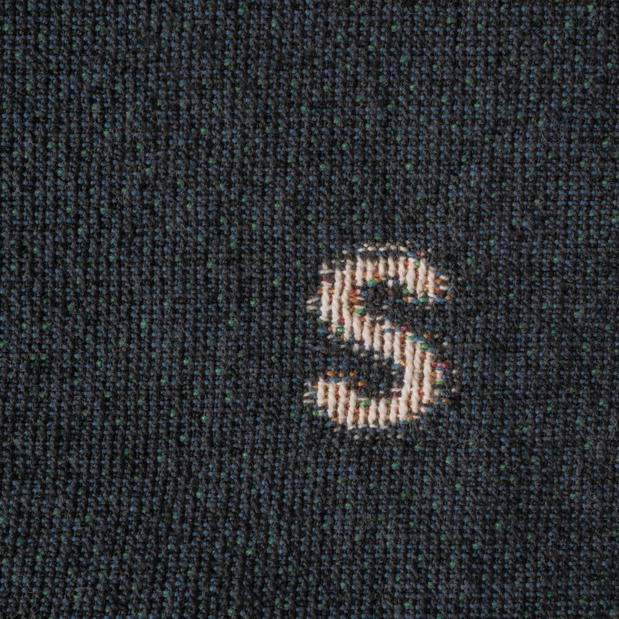 Love — No. 01 in Navy, close up, with partial letters visible across the cotton weave. #color_navy